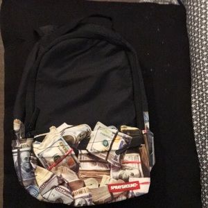Brand new small money rolled spray ground backpack